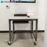 small computer workstation with casters