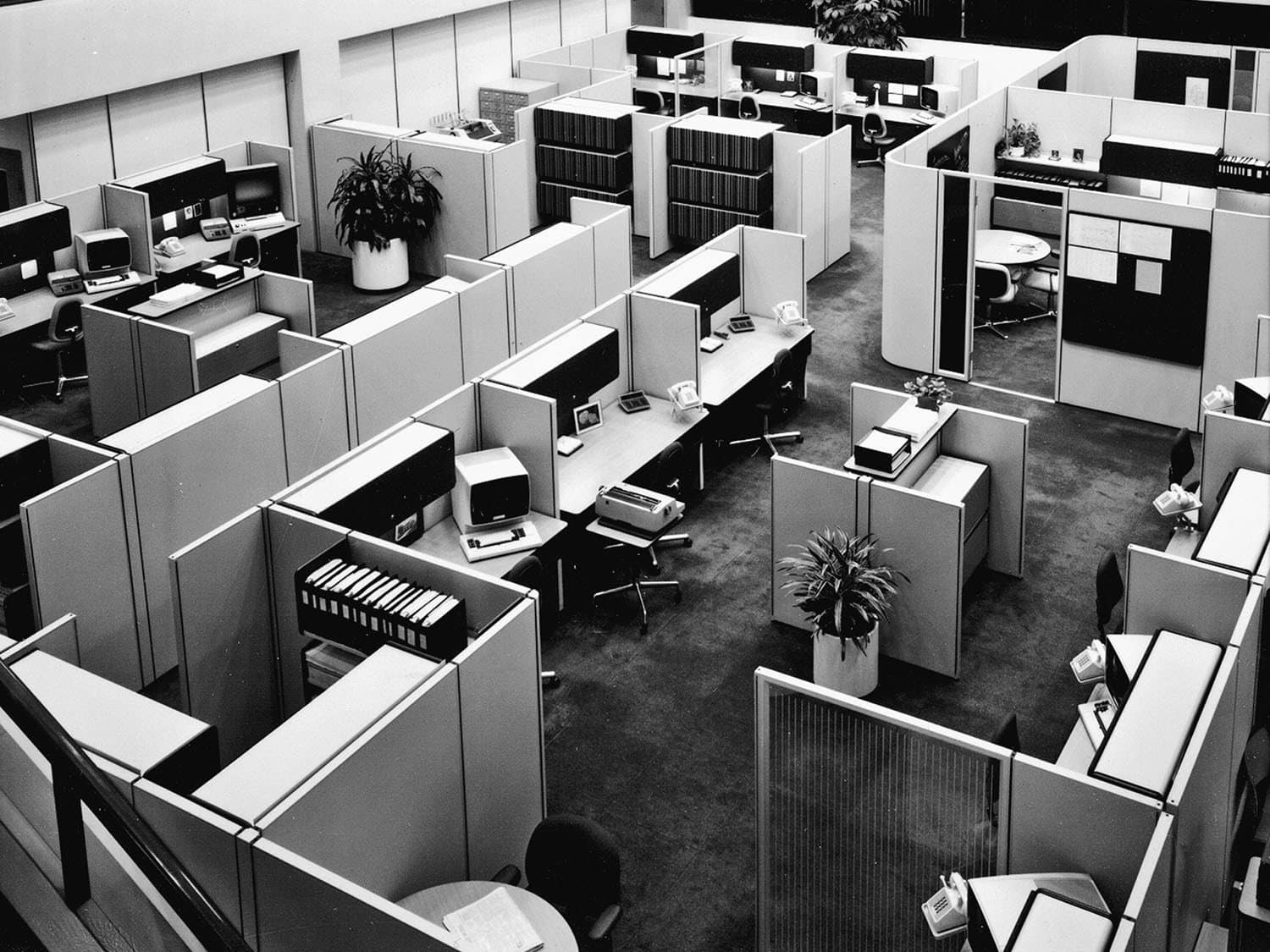 The stereotypical office cube farm environment has been a fertile source of humor, inspiring the Dilbert comic strip, the movie Office Space and both the British and US versions of the television series The Office. But Hermann Miller's 1967 Action Office II by designer Robert Probst was well received as a positive step when it was new. In time however, space planners crammed more and more of the units into offices, as shown in this photo. The stereotypical office cube farm environment has been a fertile source of humor, inspiring the Dilbert comic strip, the movie Office Space and both the British and US versions of the television series The Office. But Hermann Miller's 1967 Action Office II by designer Robert Probst was well received as a positive step when it was new. In time however, space planners crammed more and more of the units into offices, as shown in this photo.