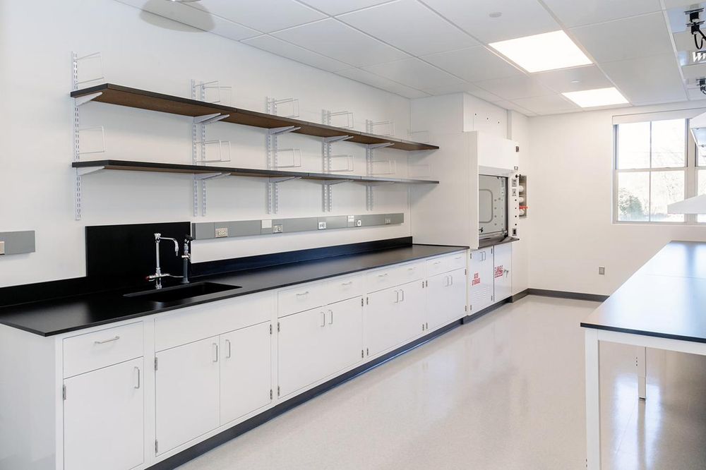Cure Rare Disease R&D wet lab with fixed casework and fume hood